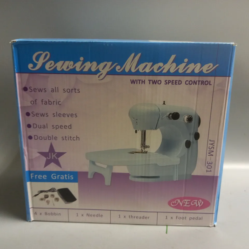 BOXED SEWING MACHINE WITH TWO SPEED CONTROL