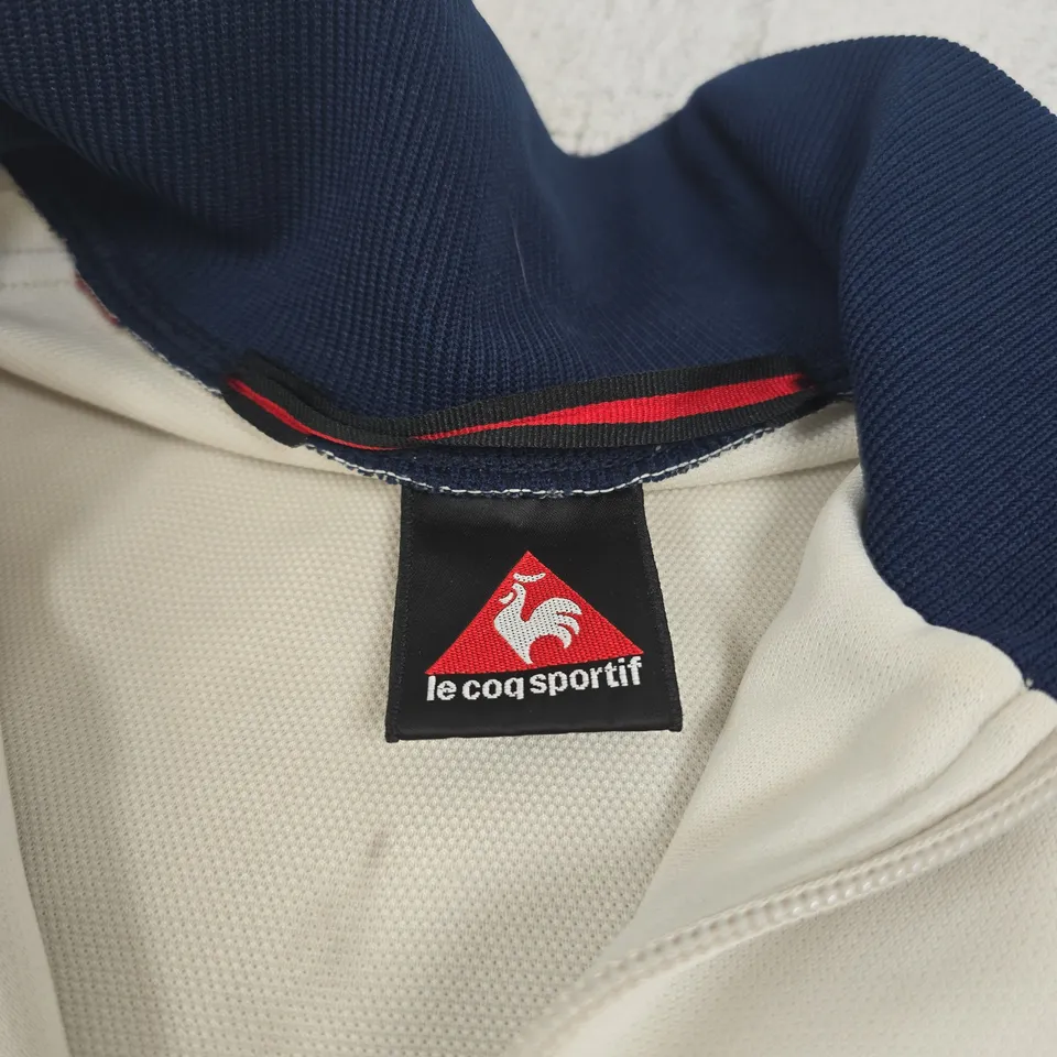 LE COQ SPORTIF JACKET – WHITE WITH NAVY COLLAR, RED SIDE STRIPES SIZE UNSPECIFIED