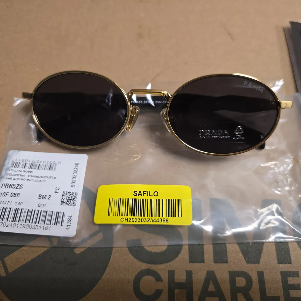 PRADA MILANO GOLD TONE OVAL SUNGLASSES WITH BLACK LENSES