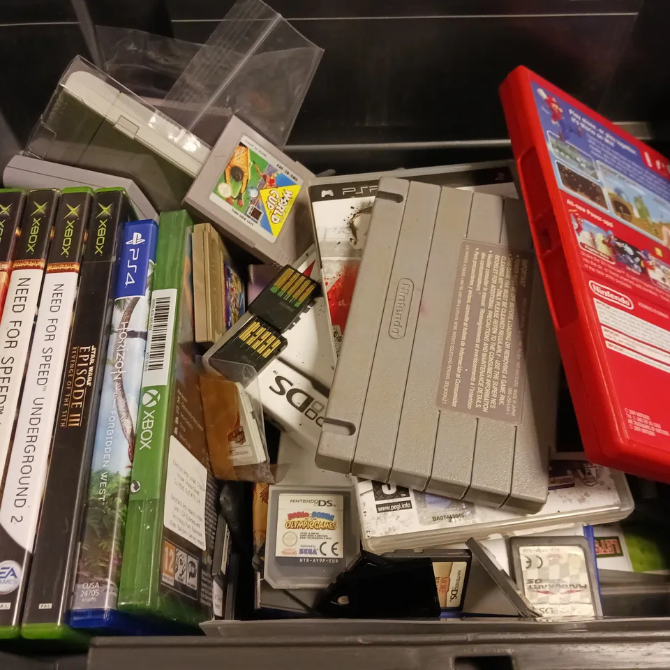 BOX OF APPROXIMATELY 20 ASSORTED VIDEO GAMES TO INCLUDE - PS4 EA FC24 , XBOX ONE LEGO NINJAGO MOVIE VIDEO GAME , XBOX ONE STAR WARS JEDI FALLEN ORDER ETC
