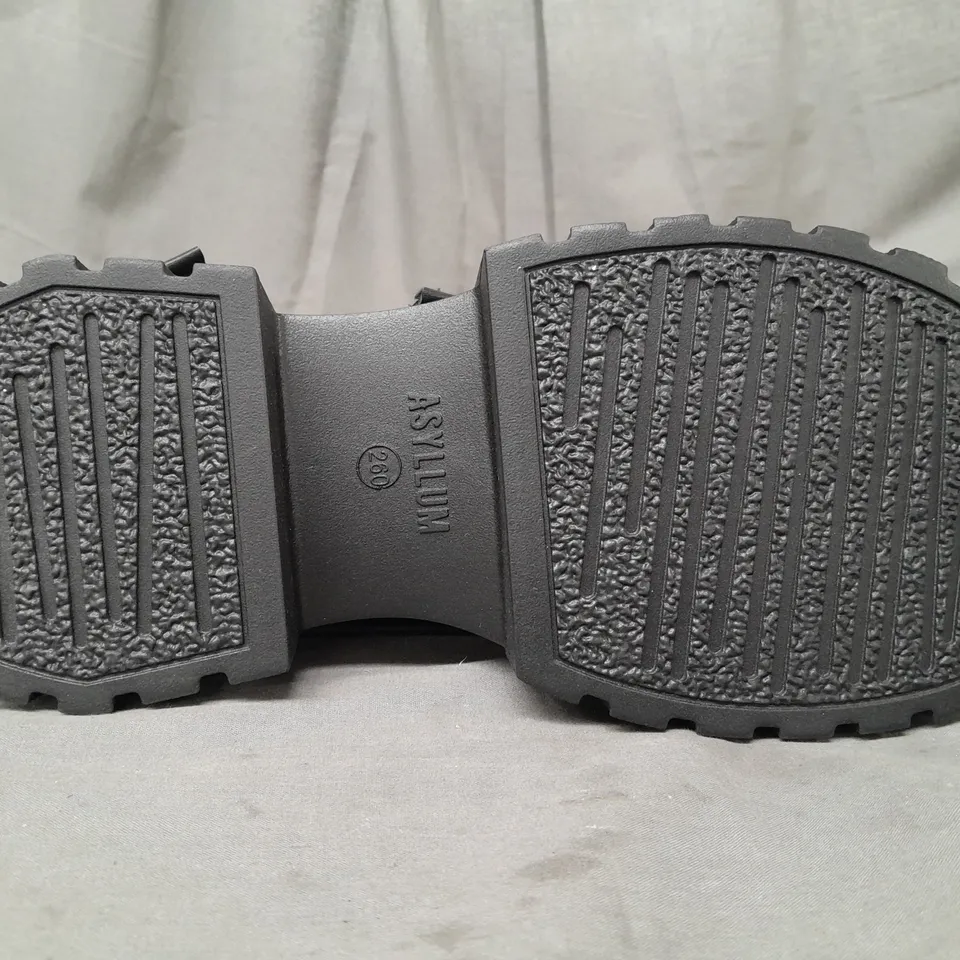 BOXED PAIR OF ASYLUM ANKLE BOOTS IN BLACK ASIAN SIZE 260