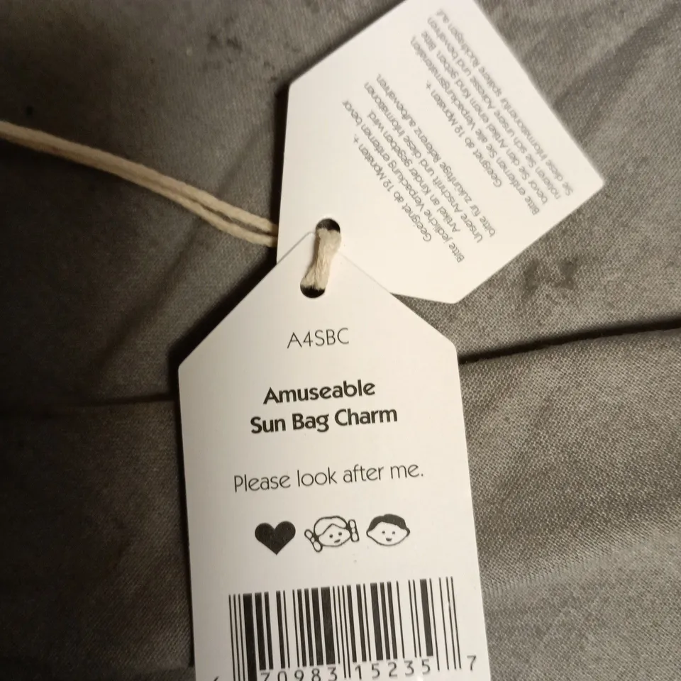 JELLYCAT AMUSEABLE SUN BAG CHARM, JELLYCAT LONDON – YELLOW SUN WITH BROWN FEET