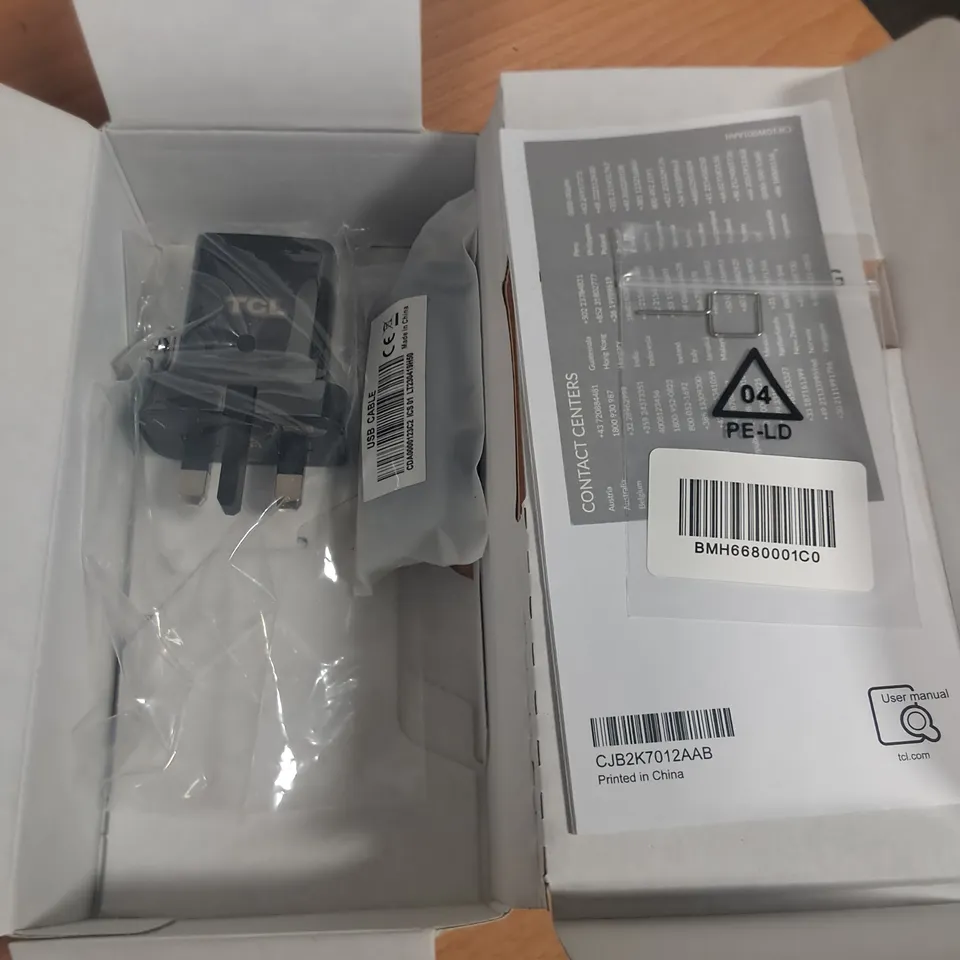 BOXED TCL 40 R5G 64GB IN STARLIGHT BLACK - T771K