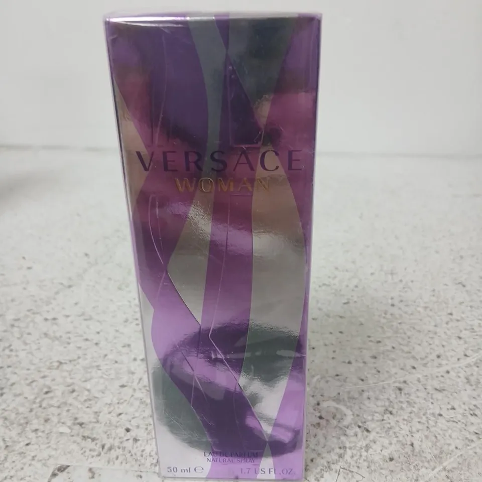 BOXED AND SEALED VERSACE WOMAN EAU DE PARFUM SPRAY 50ML