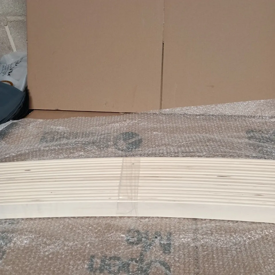 APPROXIMATELY 10 PIECES OF WOOD WITH A SLIGHT BEND