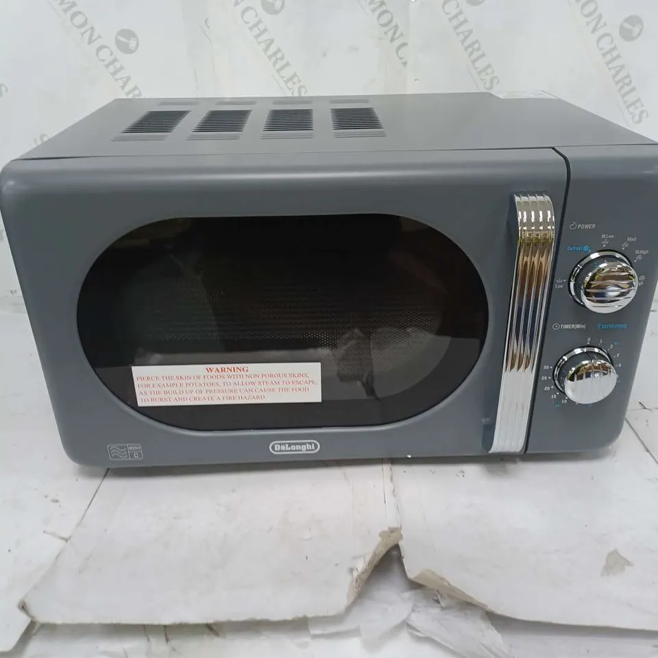 BOXED DELONGHI MICROWAVE OVEN 