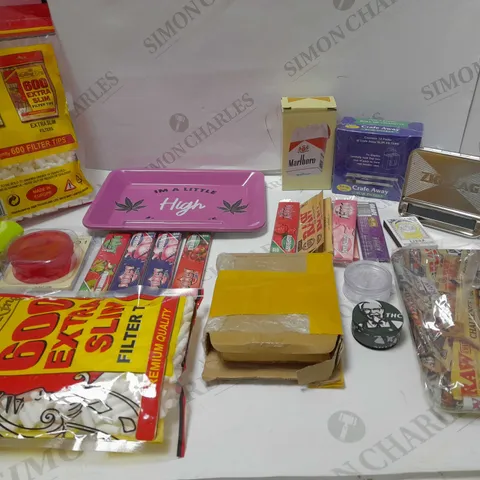 LOT OF ASSORTED SMOKING ITEMS TO INCLUDE FILTERS, TOBACCO GRINDERS AND ROLLING PAPERS