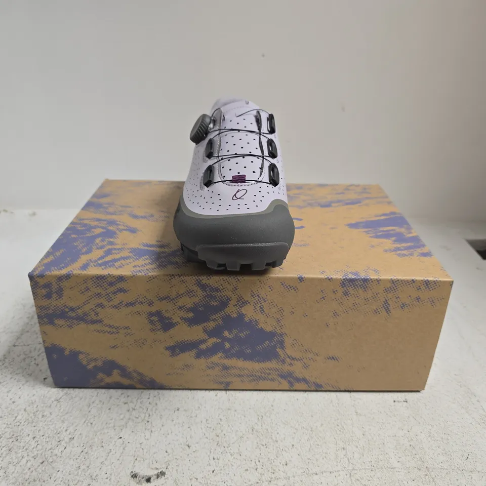 BOXED PAIR OF QUOC GRAN TOURER III TRAINERS IN LILAC HAZE SIZE EU 42