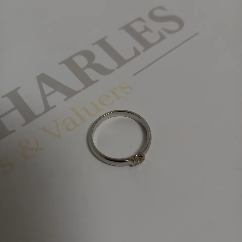 DESIGNER 18CT WHITE GOLD RING TENSION-SET WITH A DIAMOND