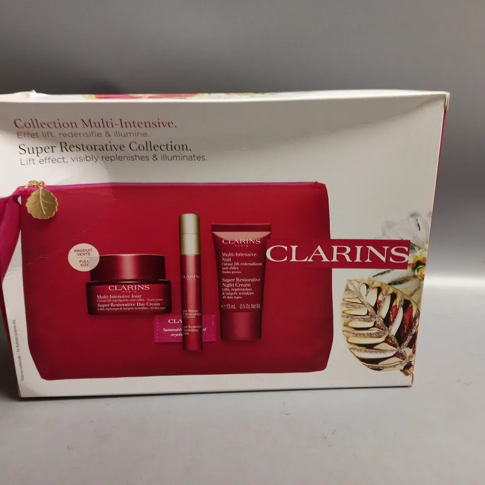 BOXED CLARINS SUPER RESTORATIVE COLLECTION SKIN CARE GIFT SET
