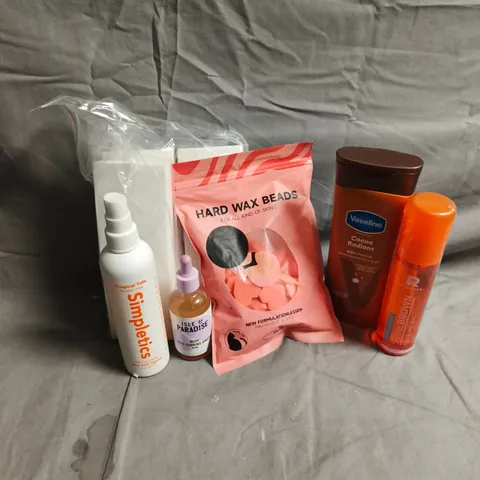 APPROXIMATEY 20 ASSORTED HEALTH AND BEAUTY PRODUCTS TO INCLUDE - HARD WAX BEADS  - VASELINE COCOA RADIANT - SIMPLETICS SEA SALT SPRAY - ETC