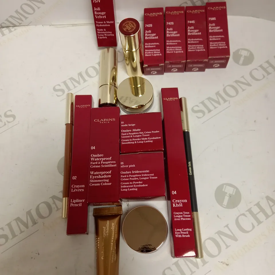 LOT OF APPROX 9 TO INCLUDE CLARINS IRIDESCENT EYESHADOW , CLARINS MOISTURIZING SHEER LIPSTICK , ETC