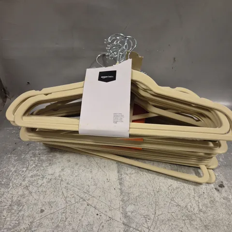 APPROXIMATELY 30 FABRIC LINED CLOTHES HANGERS