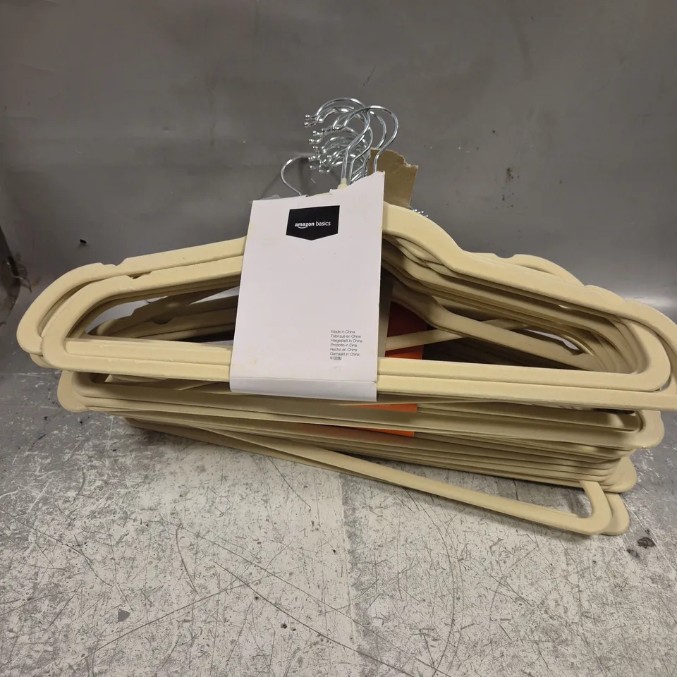 APPROXIMATELY 30 FABRIC LINED CLOTHES HANGERS 