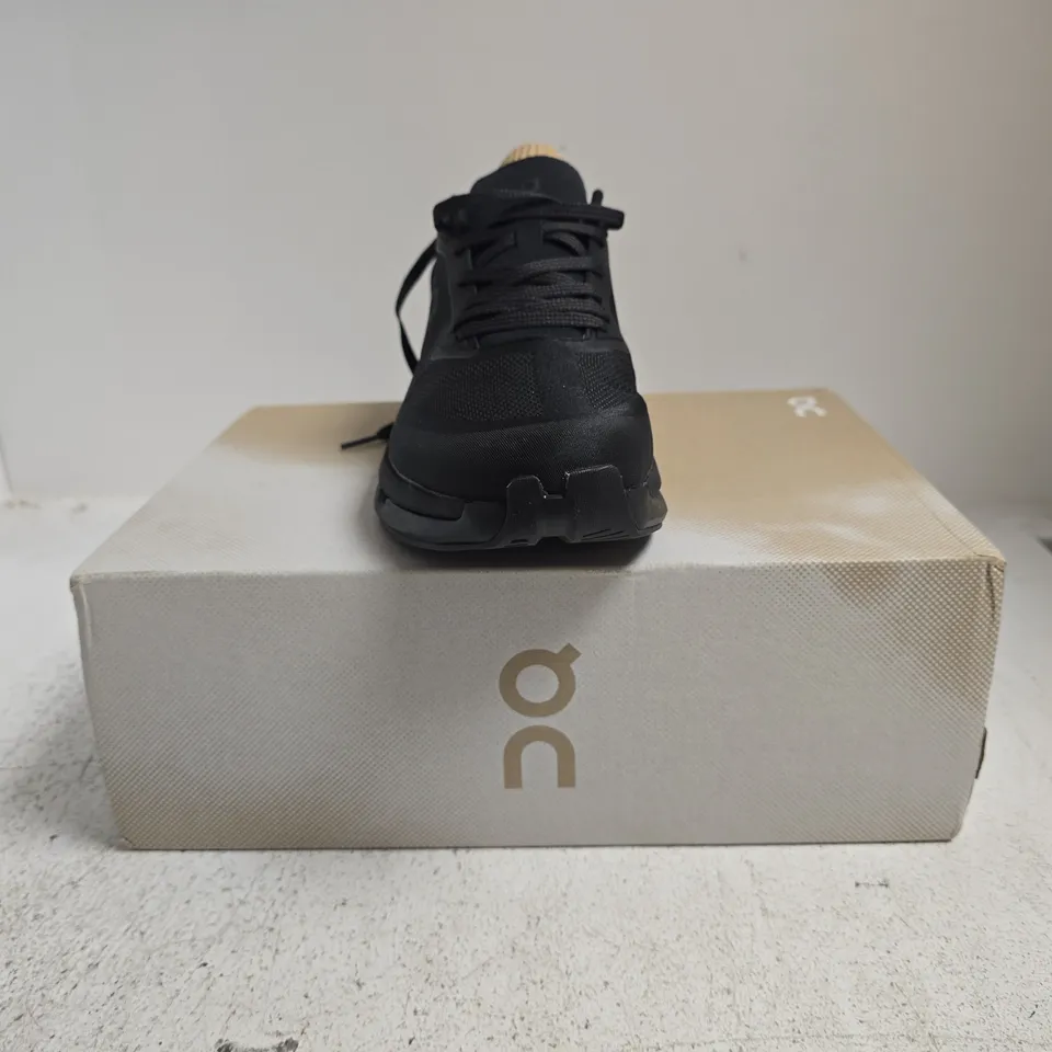 BOXED PAIR OF ON CLOUDZONE TRAINERS IN BLACK SIZE UK 8