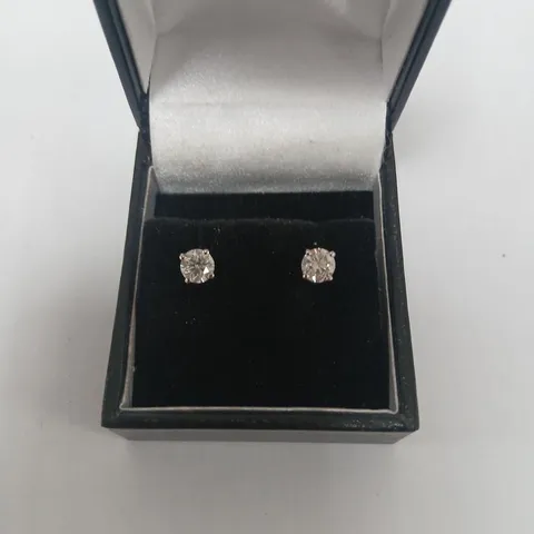 PLATINUM STUD EARRINGS SET WITH NATURAL DIAMONDS WEIGHING +1.04CT