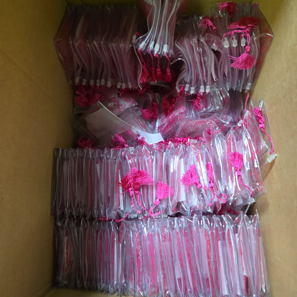 BOX OF APPROX 100 SMALL COSMETIC BAGS IN CLEAR/PINK TASSLE