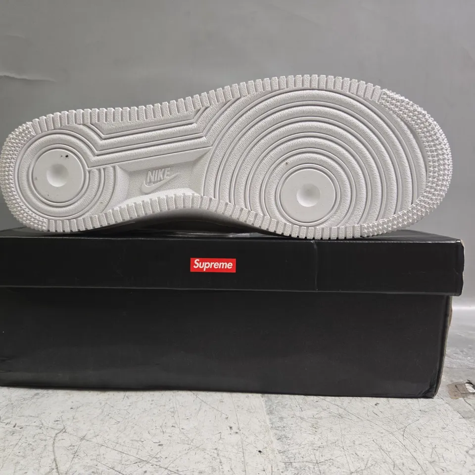 BOXED PAIR OF NIKE AIR FORCE 1 LOW SUPREME SHOES IN WHITE SIZE UK 11