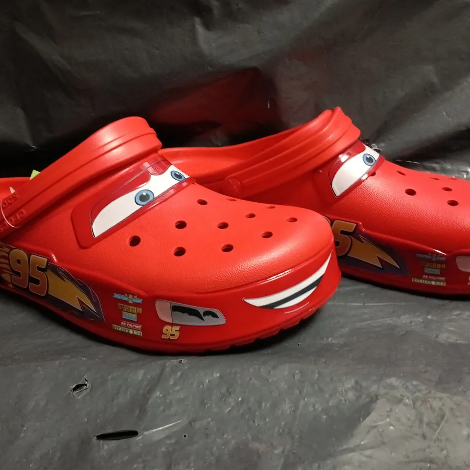 PAIR OF CROCS LIGHTNING MCQUEEN CROCBAND CLOGS SIZE UK M11/W12