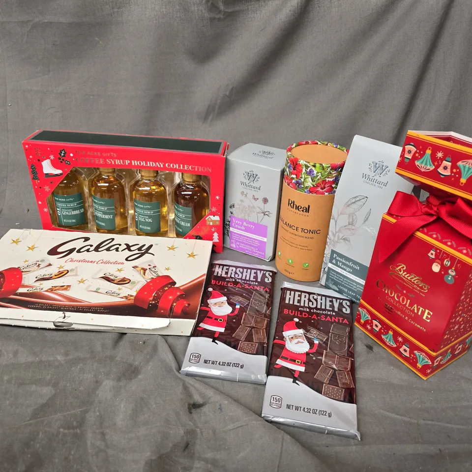 APPROXIMATELY 9 ASSORTED FOOD & DRINK ITEMS TO INCLUDE GALAXY CHRISTMAS COLLECTION, RHEAL BALANCE TONIC, HERSHEYS CHOCOLATE, ETC - COLLECTION ONLY