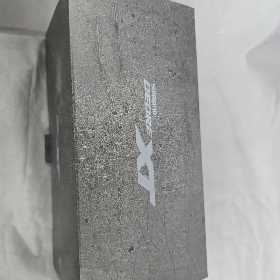 SHIMANO DEORE DX BICYCLE HUB COMPONENT – BOXED, BLACK CYLINDRICAL PART