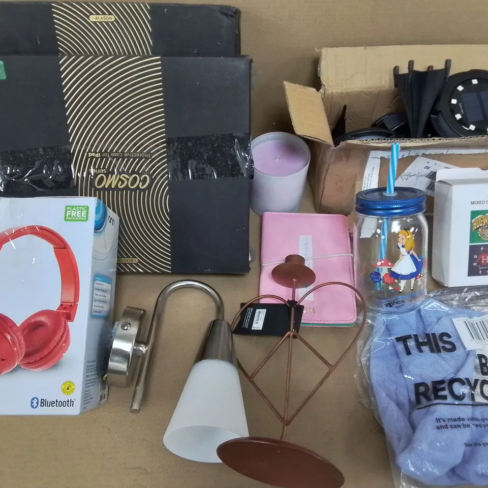 LOT OF ASSORTED HOUSEHOLD ITEMS TO INCLUDE SOLAR LIGHTS, PROTECTIVE IPAD CASES AND WIRELESS HEADPHONES