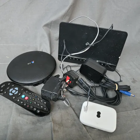 APPROXIMATELY 15 ASSORTED HOUSEHOLD ITEMS TO INCLUDE routers, cables, remotes, etc