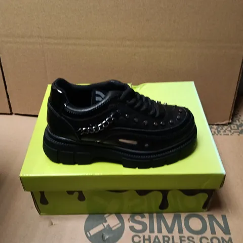 BOXED PAIR OF KOI LIL BANE OF EXILE TRAINERS - UK KIDS SIZE 12