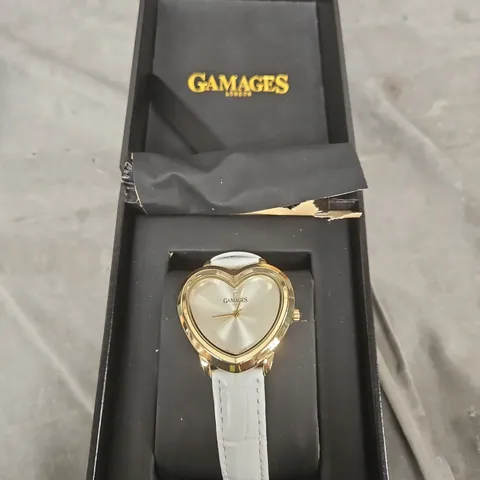 GAMAGES LONDON HEART-SHAPED LADIES' WATCH – GOLD TONE CASE, WHITE STRAP 