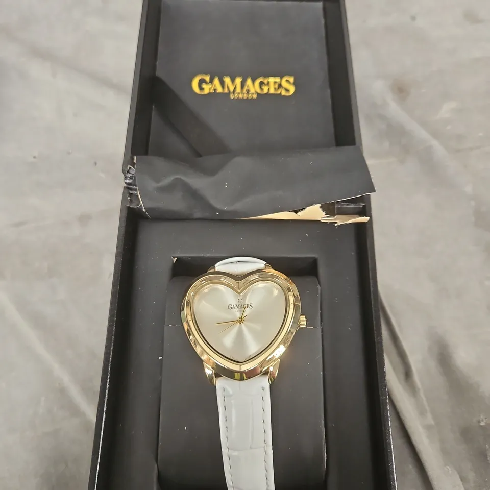 GAMAGES LONDON HEART-SHAPED LADIES' WATCH – GOLD TONE CASE, WHITE STRAP