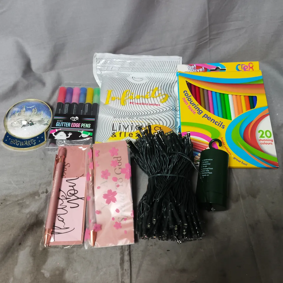 APPROXIMATELY 6 ASSORTED HOUSEHOLD ITEMS TO INCLUDE COLOURING PENCILS, LIGHTS AND EDGE PENS 