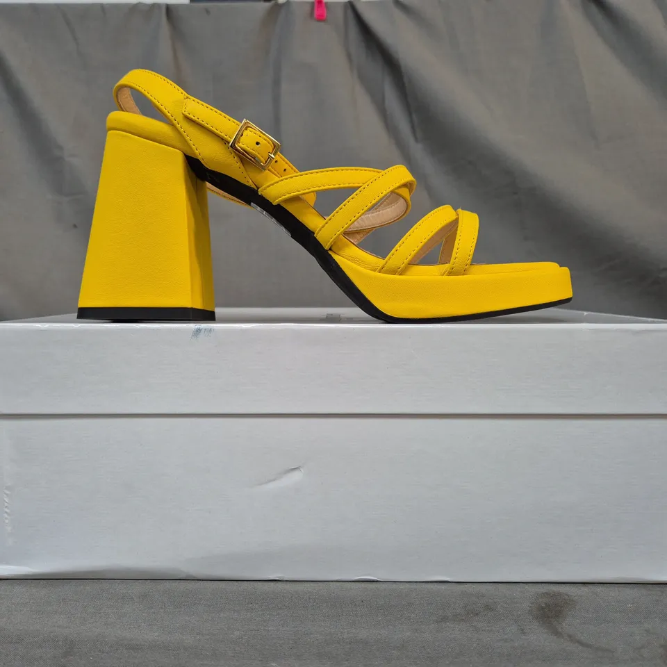 BOXED PAIR OF RUSSELL & BROMLEY OPEN TOE BLOCK HEEL STRAPPY SANDALS IN YELLOW EU SIZE 39.5