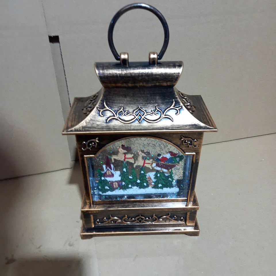 FESTIVE PRE-LIT MUSICAL WATER SPINNER WITH SWIRLING GLITTER