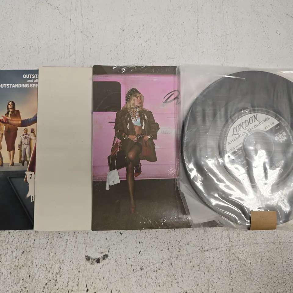 APPROXIMATELY 10 ASSORTED 7" VINYL RECORDS