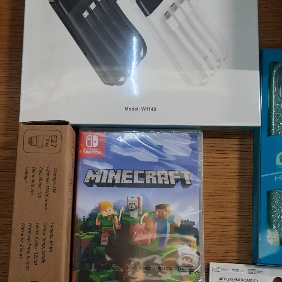 LARGE QUANTITY OF ASSORTED ITEMS TO INCLUDE CHARMAST POWER BANK, MINECRAFT FOR SWITCH AND ICICLE STRING LIGHTS 