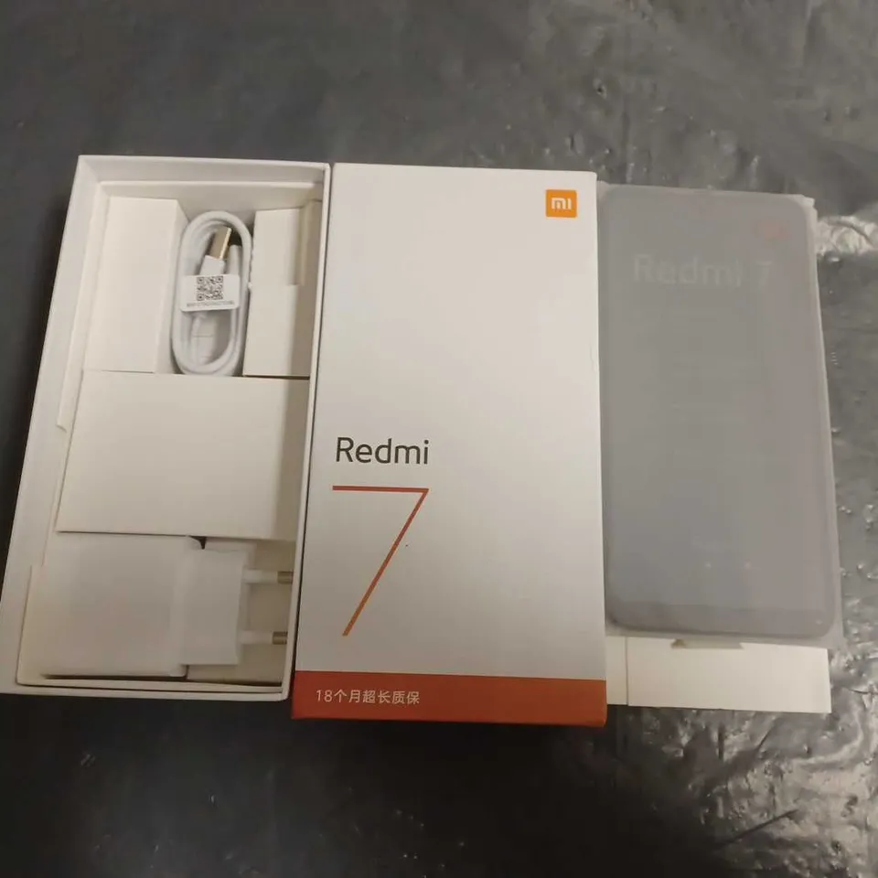 BOXED REDMI 7 4+64GB PHONE IN BLACK