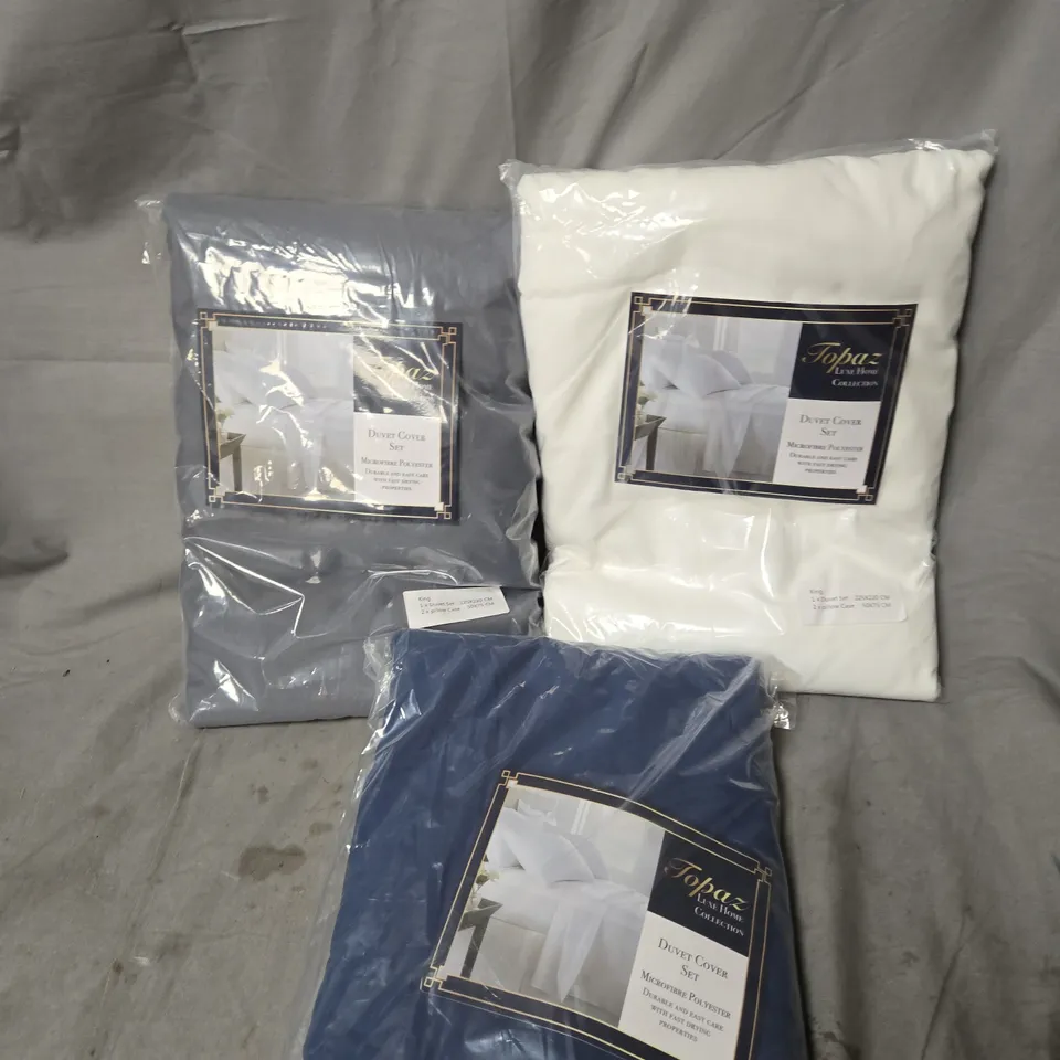 APPROXIMATELY 10 TOPAZ LUXE HOME COLLECTION DUVET COVER SETS - VARIOUS COLOURS AND SIZES