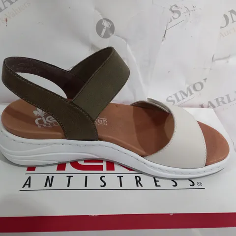 BOXED PAIR OF RIEKER SANDALS IN GREEN SIZE 6