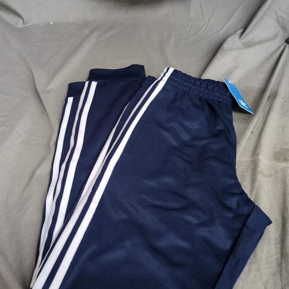 ADIDAS ORIGINALS NAVY TRACK PANTS WITH WHITE SIDE STRIPES – UK SIZE S
