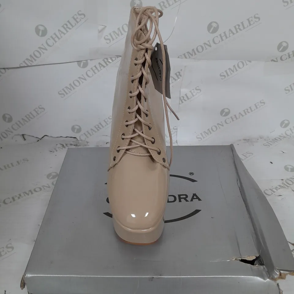 BOXED PAIR OF CASANDRA PLATFORM LACE UP ANKLE BOOT IN NUDE PATENT SIZE 5