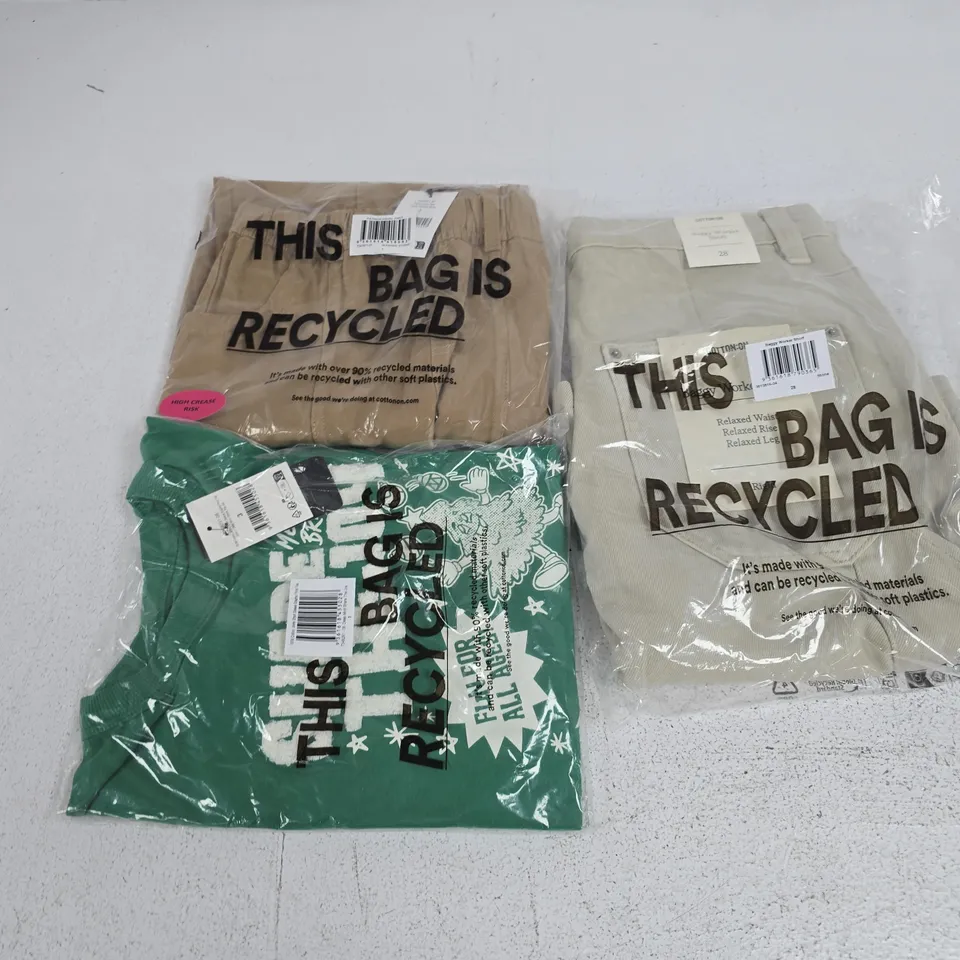 APPROXIMATELY 25 ASSORTED CLOTHING ITEMS IN VARIOUS SIZES, COLOURS & STYLES TO INCLUDE BAGGY WORKER SHORTS, GRAPHIC PRINT TEE, PATRICK PANEL PANTS, ETC