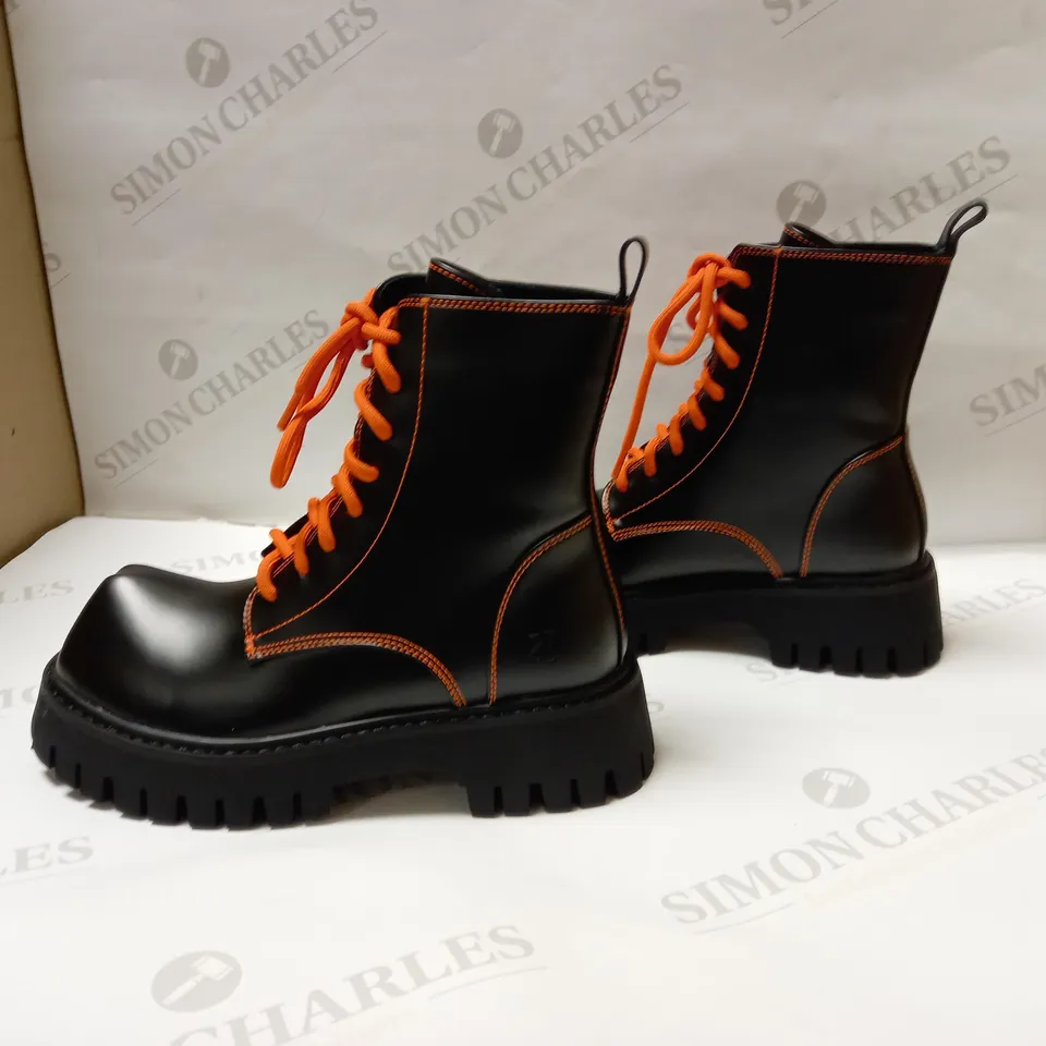 DESIGNER KOI VEGAN BOZO ORANGE AND BLACK FORK TOE BOOTS SIZE 3