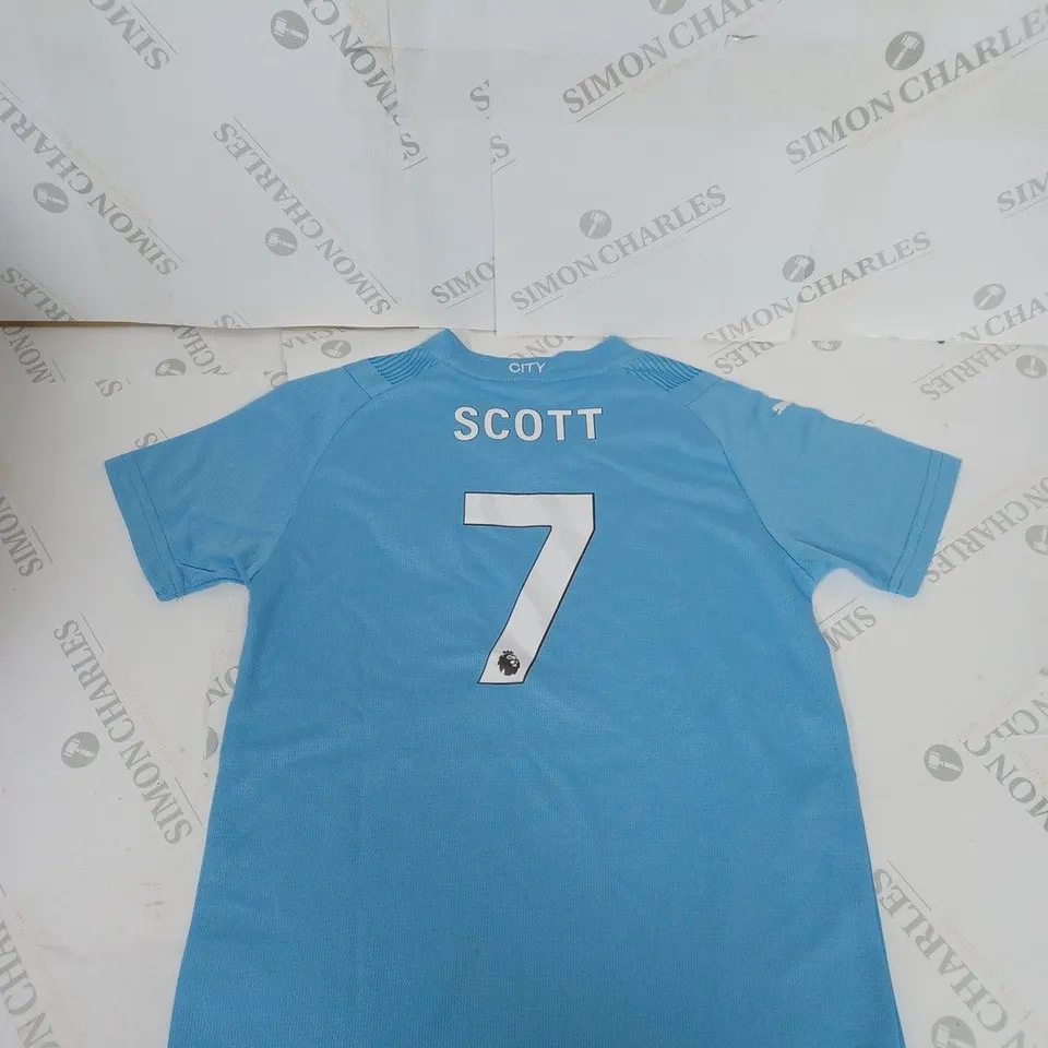 MANCHESTER CITY FC HOME SHIRT AND SHORTS WITH SCOTT 7 ON THE BACK SIZE 24