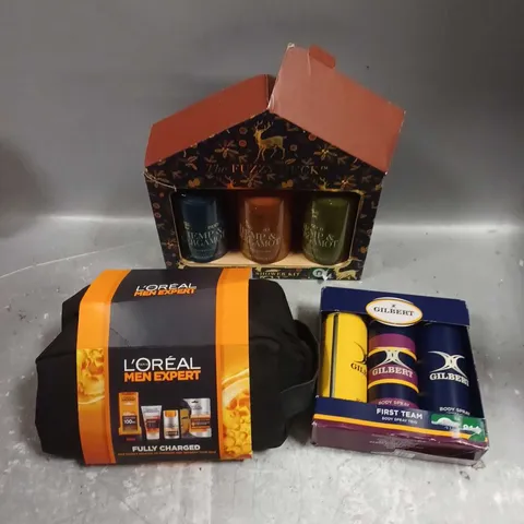 LOT OF 3 ASSORTED COSMETIC BOXSETS TO INCLUDE - GILBERT FIRST TEAM BODY SPRAY TRIO - L'OREAL MEN EXPERT FULLY CHARGED COLLECTION - FUZZY DUCK MENS SHOWER KIT