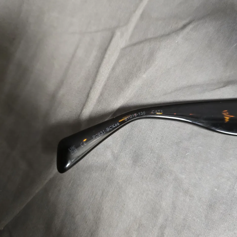 JIMMY FAIRLY SUNGLASSES – BLACK FRAME WITH BLUE LENSES (BOXED)