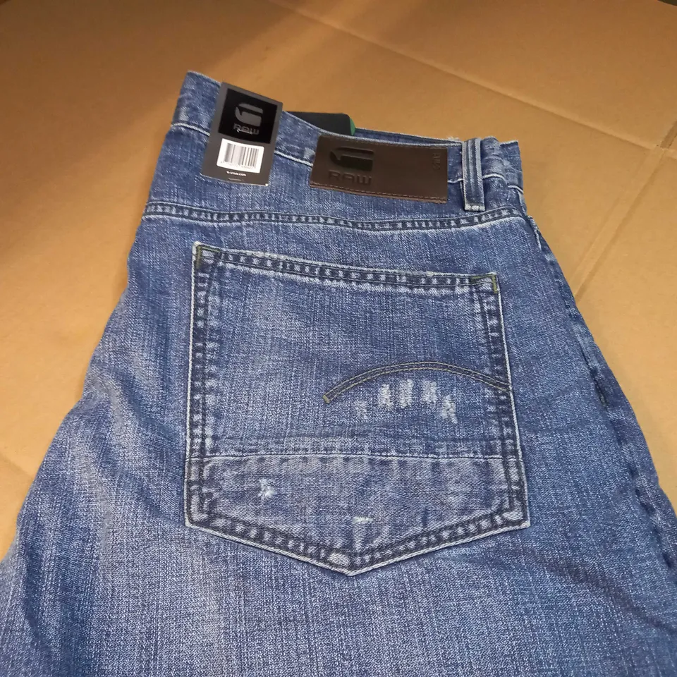 RAW BLUE DISTRESSED JEANS - SIZE W38/L34