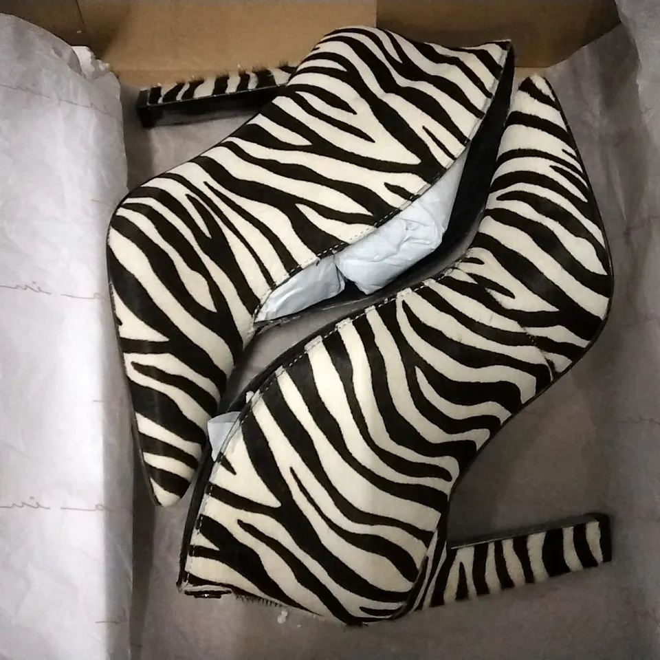 3 SHOE BOXES CONTAINING MODA IN PELLE WELDI ZEBRA V CUT SHOE BOOTS SIZE 3, DUNE LONDON BLACK LEATHER SNAFFLE TRIM LOAFERS - SIZE 8, MODA IN PELLE EMBELLISHED WEDGE MULTI BLUE SNAKE SIZE 5