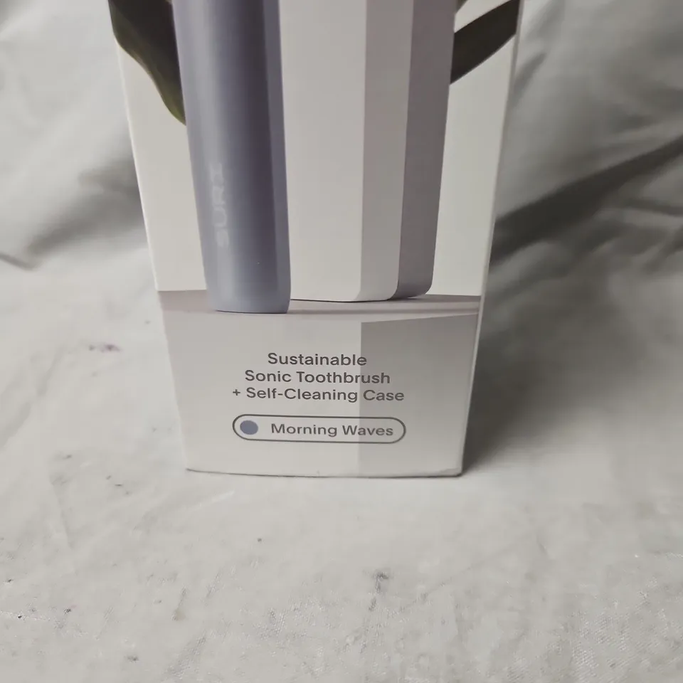 BOXED AND SEALED SURI SUSTAINABLE SONIC TOOTHBRUSH + SELF-CLEANING CASE - MORNING WAVES