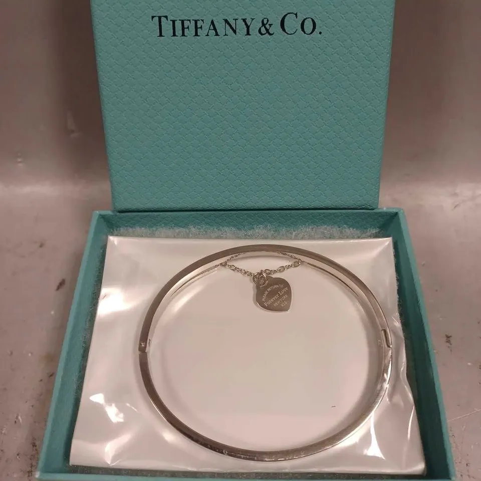 TIFFANY & CO SILVER ENGRAVED HEART CHARM BANGLE 