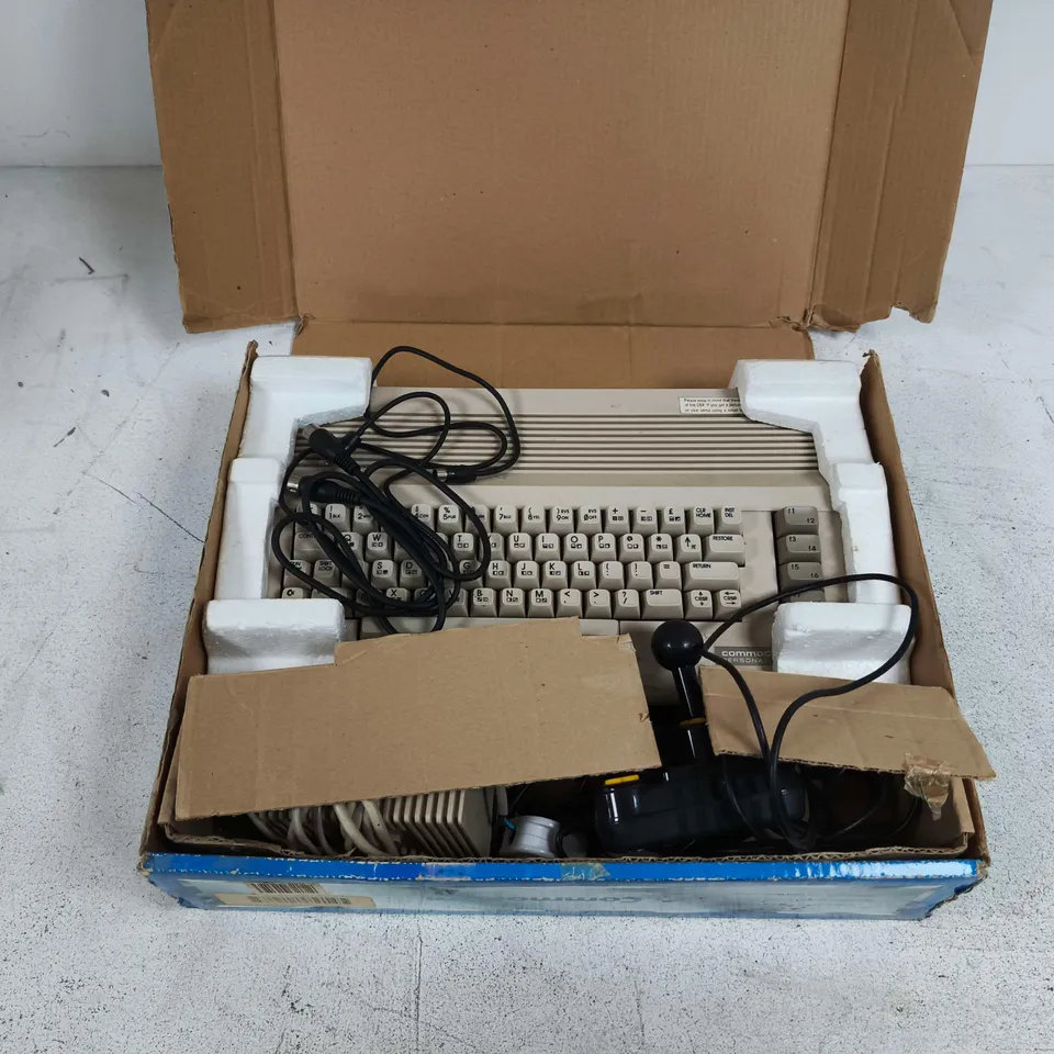 COMMODORE 64 TERMINATOR 2 THEMED BOX COMPUTER WITH JOYSTICK BOXED